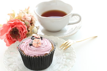 Blueberry cup cake and tea
