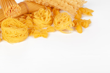 Delicious mixed pasta on white background