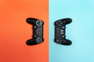  Photo of modern black gamepad colorful background © brizmaker
