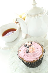 Blueberry cup cake and tea