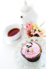 Blueberry cup cake and tea