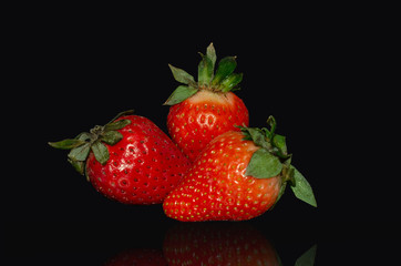  fresh strawberries. black background. crop 2019. one or more. Healthy food. Healthy lifestyle