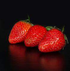  fresh strawberries. black background. crop 2019. one or more. Healthy food. Healthy lifestyle
