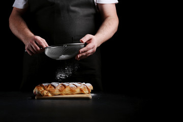 strudel on dark background. baker cooking concept
