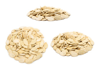Set of handfuls of seeds from different angles - pumpkin seeds in the shell, close up, isolated on white background