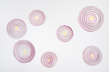 fresh ripe sliced red onions on grey background