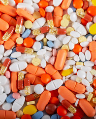 Colorful tablets and pills background