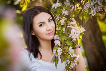 There is magic in her brown eyes. Cropped shot of a young pretty lady posing in nature