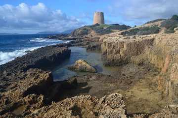Fototapeta na wymiar La costa e la Torre di Piscinnì