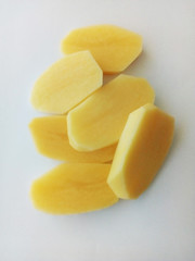 potato slices on white bakground