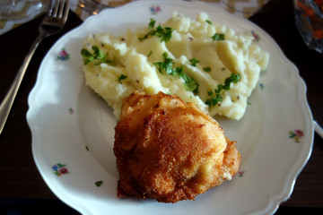 Roast chicken with mashed potatoes on a plate