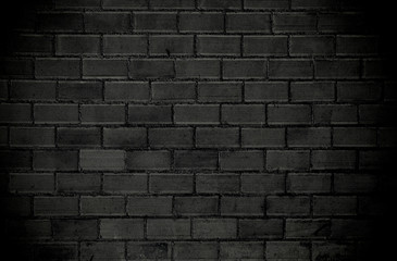 Gray brick wall with dark vignette borders