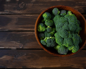 broccoli on wooden surface