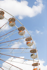 Ferris wheel container in blue sky