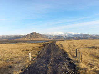 dirt road to Klifandi river and Myrdalsjokull glacier, south Iceland in winter