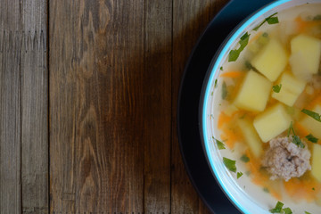 Vegetable soup with chicken cutlets.Top view with copy space.