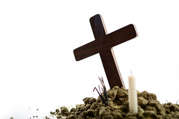 Giving respect to human soul. Give a candle and rose under Jesus cross.