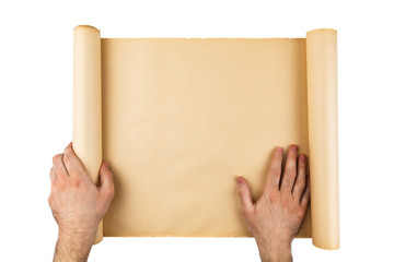 Man hands holding old worn paper scroll