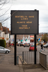 Naklejka premium digital road traffic information display message seatbelts save lives always wera your seatbelt on road in uk