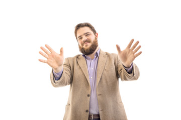 Portrait of funny big handsome smiling bearded business man in beige suit, isolated on white