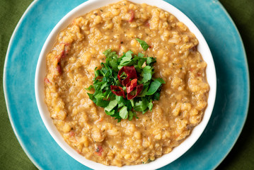 Vegetarian lentil soup with parsley. Top view.
