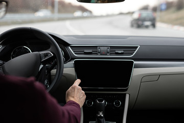 Obraz premium Close up of man using navigation in his car