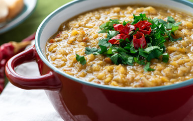 Indian soup of red lentil masoor dal. Vegetarian lentil soup.