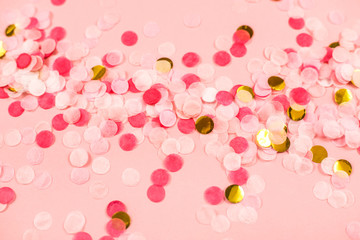 Bright multicolored confetti isolated on white background.