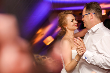 Bride and groom dancing the first dance at their wedding day