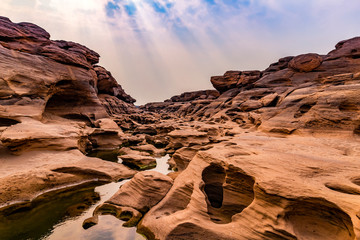 The Grand Canyon of Thailand is adjacent to the border of Laos, with the Mekong River dividing between the two countries. Named Sam Phan Bok, Ubon Ratchathani