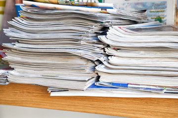 stack of newspapers on  background
