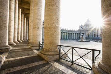 St Peter`s Basilica from Bernini`s Colonnade vatican, Rome, Italy