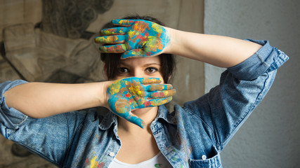 Beautiful woman with painted hands