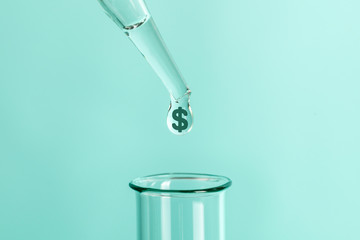 Expensive laboratory tests and analyzes. From pipette drops feces with symbol of money dollars into...