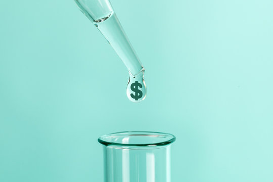 Expensive laboratory tests and analyzes. From pipette drops feces with symbol of money dollars into test tube