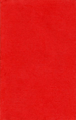 Textile texture. Red old book cover. Rough canvas surface. Blank retro page. Empty place for text. Perfect for background and vintage style design.