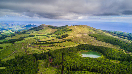 Drone view of amazing Azores landscape. Green fields on the north coast of San Miguel island, Azores, Portugal. Bird eye view, aerial panoramic view.