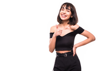 Young happy cheerful woman showing thumb up isolated on white background