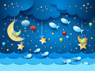 Obraz na płótnie Canvas Surreal seascape by night with balloons, birds and flying fishes