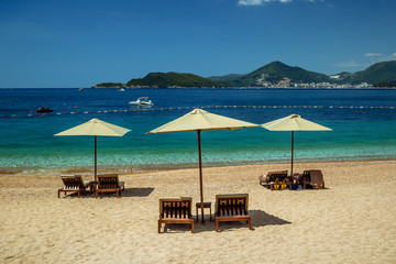 Parasol and a beautiful beach on the Adriatic Sea. Montenegro.