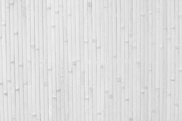Fototapeta na wymiar Old bamboo of strips on wall close up