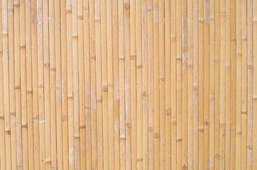 Old bamboo of strips on wall close up