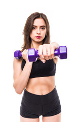 Fototapeta na wymiar Athletic woman doing exercise for arms. Portrait of muscular fitness model working out with dumbbells on grey background. Strength and motivation