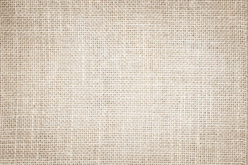 Beige abstract fabric or cream color texture background.