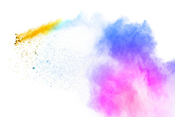 Colorful powder explosion on white background. Pastel color dust particle splashing.