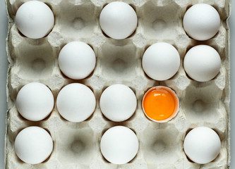 A tray of white chicken eggs. Conceptual photo.