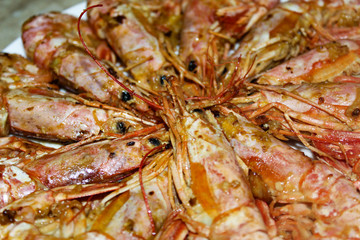 cooking shrimp fry in a pan