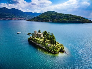 Aerial view of Loreto island, lake of Iseo in Italy.