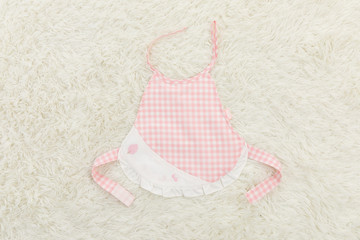 A baby bib isolated on a white background.