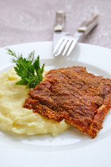 Fried hake fillet with spinach, cheese and rice